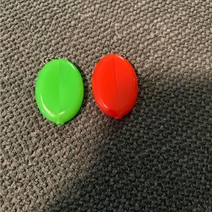 Green and orange coin holders
